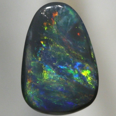 SOLID BLACK OPAL Orange to green with a hue of blue. SEE VIDEO